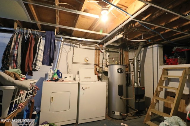 basement with washer and dryer and electric water heater