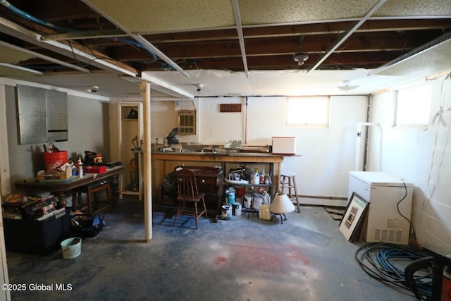 basement with a workshop area