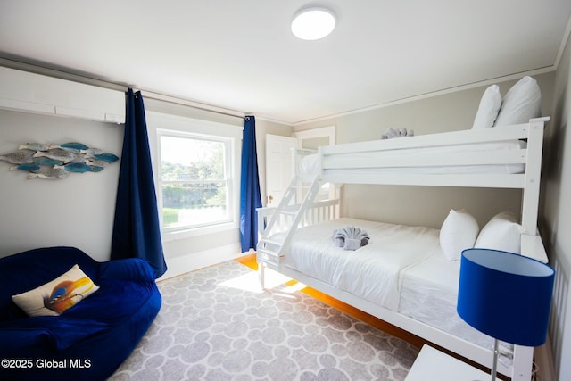 bedroom with ornamental molding