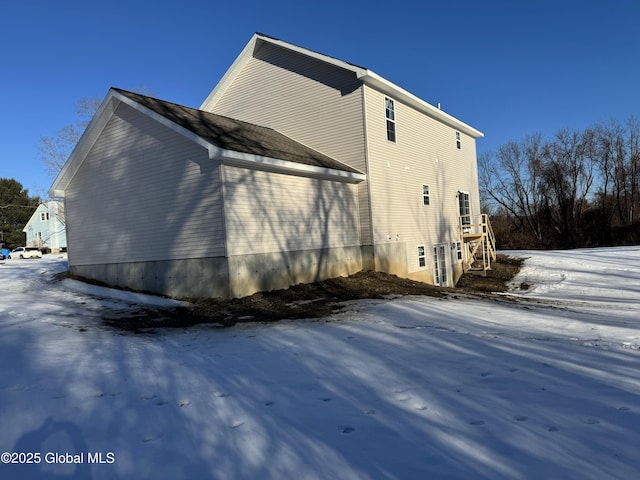 view of snow covered property