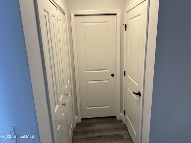 hallway featuring dark hardwood / wood-style floors