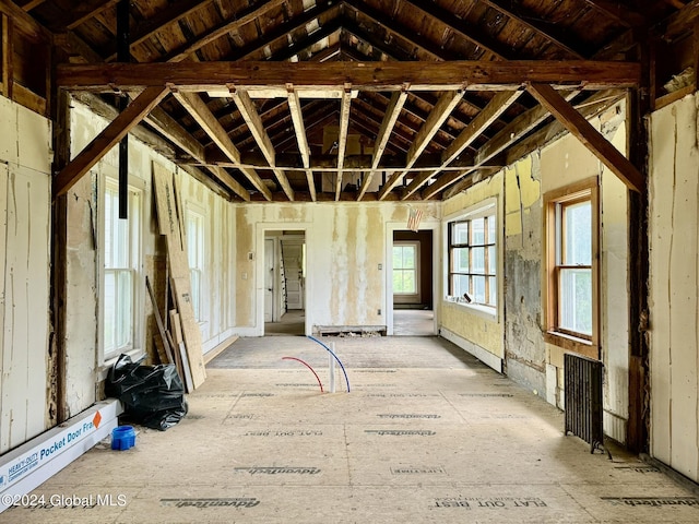 misc room featuring radiator, wooden ceiling, and lofted ceiling