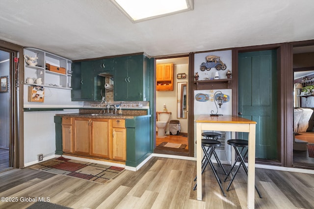 kitchen featuring sink and light hardwood / wood-style floors