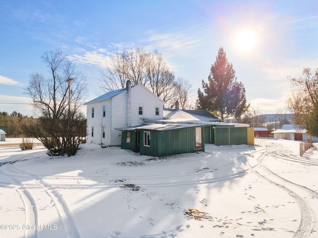 view of snow covered property