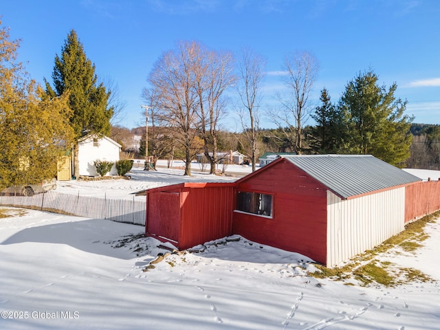 view of yard layered in snow