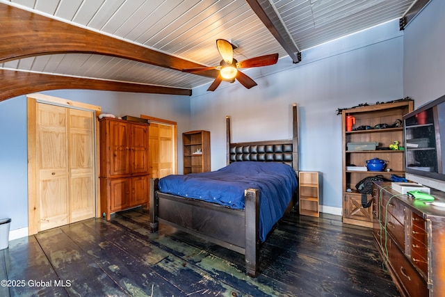 bedroom with ceiling fan, dark hardwood / wood-style floors, lofted ceiling with beams, and wood ceiling