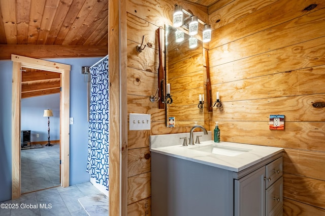 bathroom featuring vanity, lofted ceiling, and wood ceiling