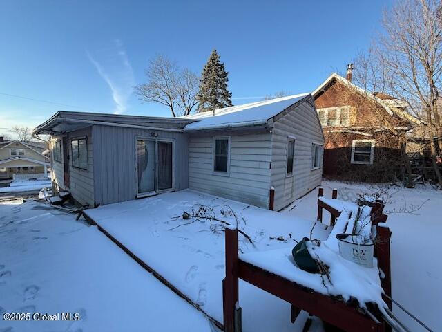 view of snow covered house