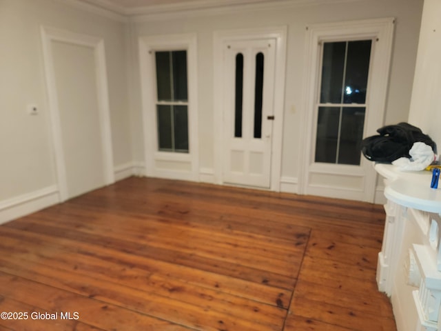 empty room featuring wood-type flooring