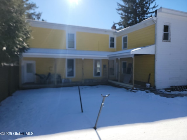 view of snow covered property