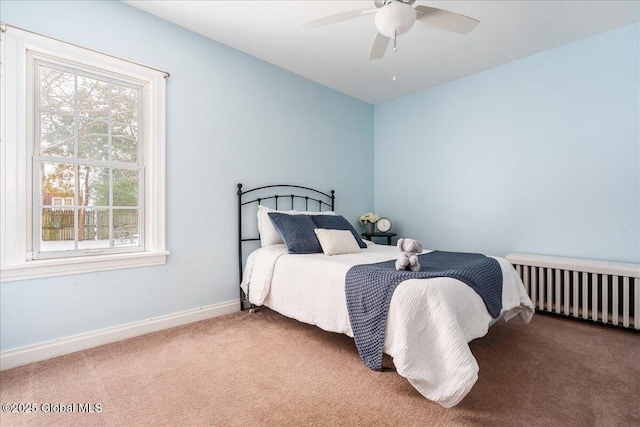 bedroom featuring ceiling fan, carpet flooring, and radiator