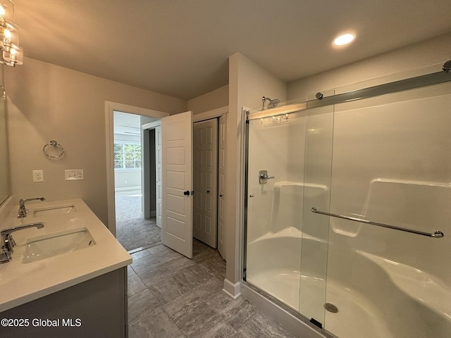 bathroom featuring vanity and walk in shower