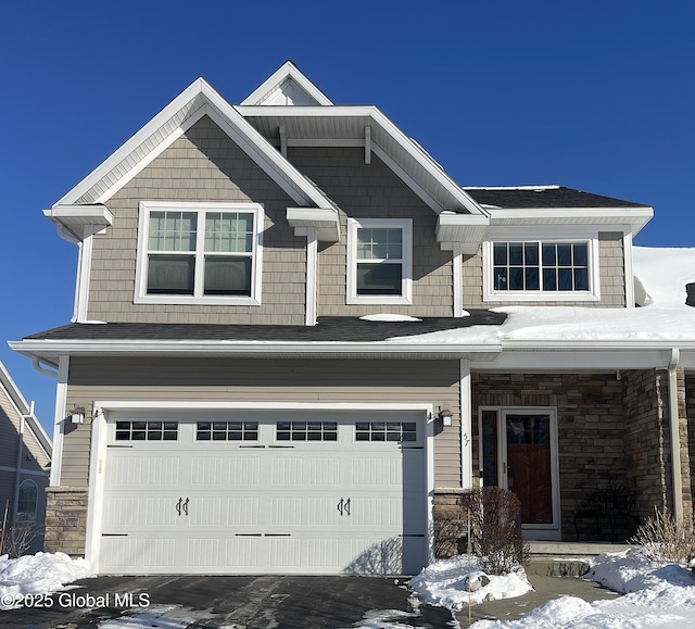 craftsman-style home with a garage