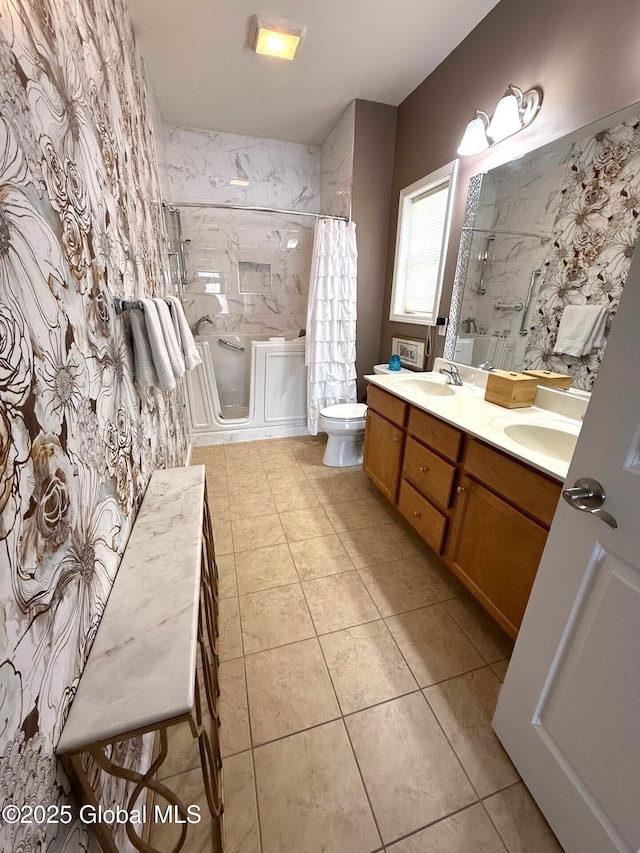 bathroom featuring toilet, walk in shower, vanity, and tile patterned flooring