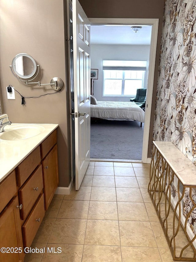 bathroom with vanity and tile patterned flooring