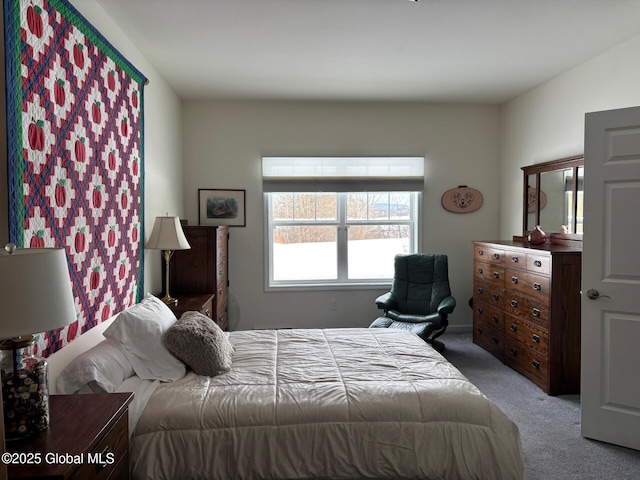 bedroom featuring light colored carpet