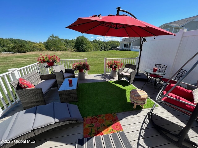 view of patio / terrace featuring a wooden deck and outdoor lounge area