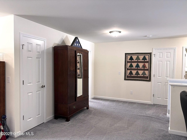 interior space featuring carpet