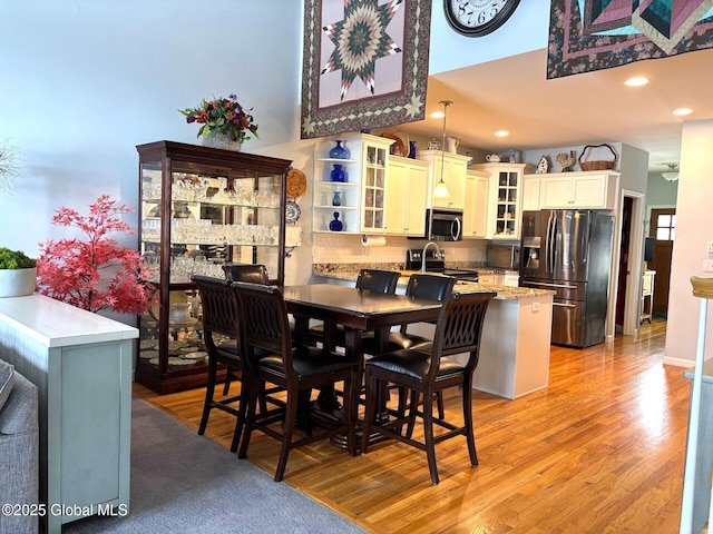 dining room featuring light hardwood / wood-style floors