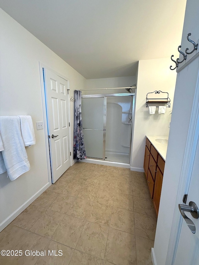 bathroom with vanity and a shower with curtain