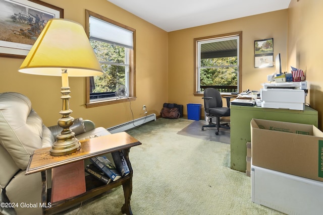 home office with carpet floors and a baseboard heating unit