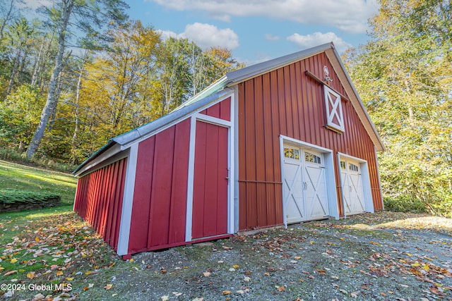 view of outbuilding featuring a garage