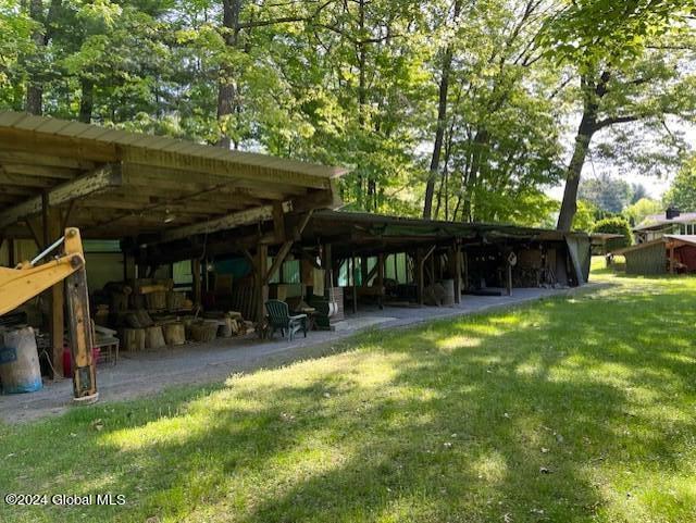 surrounding community with a yard