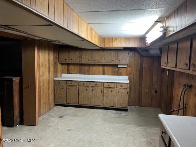 finished basement with wood walls