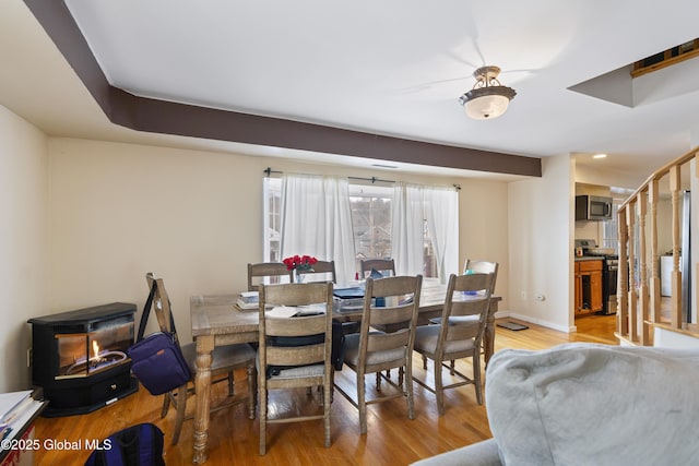 dining area with light wood-type flooring