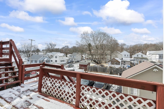 view of snow covered deck