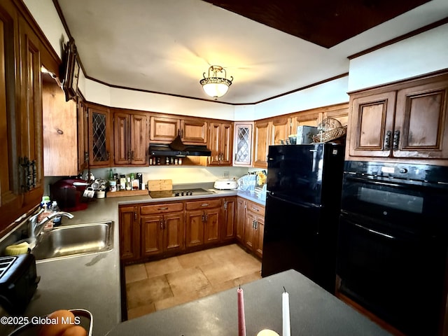 kitchen with sink, black appliances, and light tile patterned floors