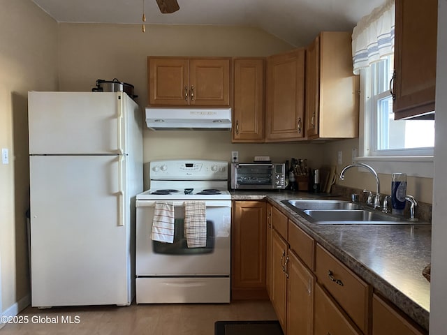 kitchen featuring ceiling fan, lofted ceiling, sink, and white appliances