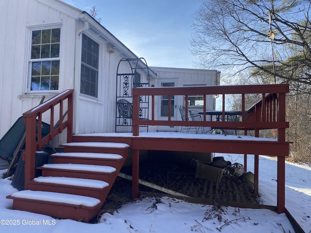 view of snow covered deck