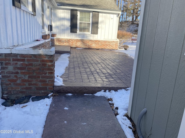 view of snow covered patio