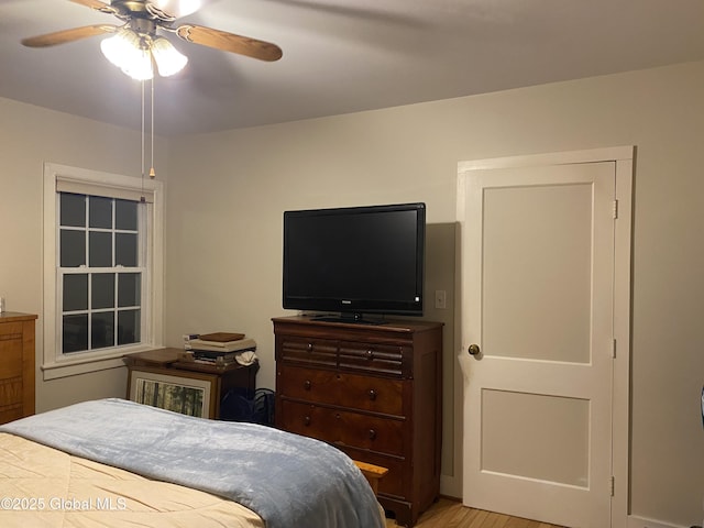 bedroom featuring ceiling fan