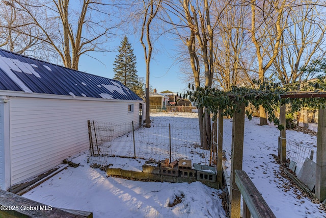 view of yard covered in snow