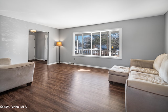 living room featuring dark hardwood / wood-style floors