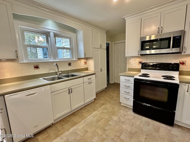 kitchen featuring a sink, electric stove, dishwasher, stainless steel microwave, and backsplash