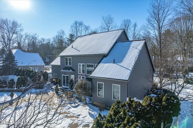 view of snow covered property