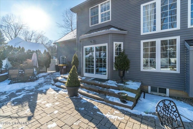 view of snow covered patio