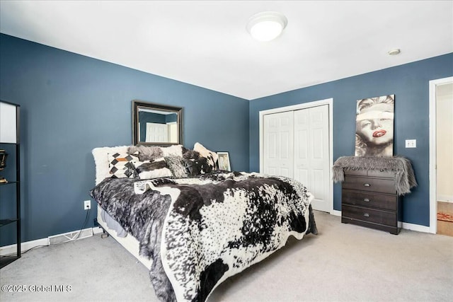 carpeted bedroom featuring a closet