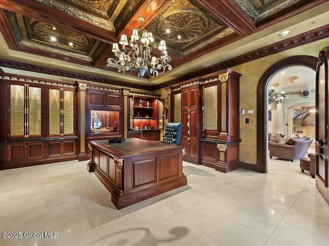 office area with light tile patterned floors, arched walkways, coffered ceiling, crown molding, and a notable chandelier