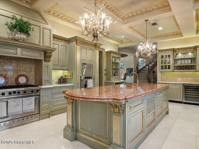 kitchen with beverage cooler, stainless steel appliances, tasteful backsplash, and an inviting chandelier