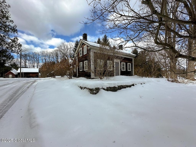 view of snow covered property