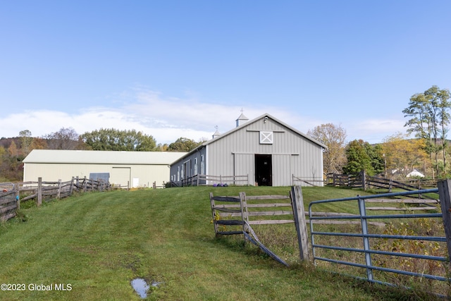 view of outdoor structure with a yard