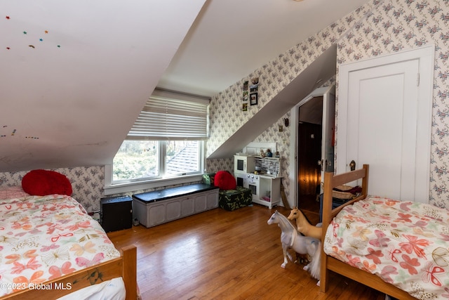 bedroom featuring wood-type flooring