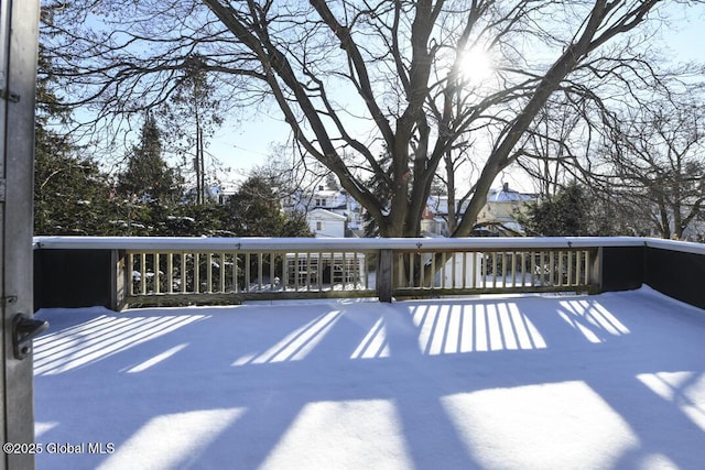 view of snow covered deck