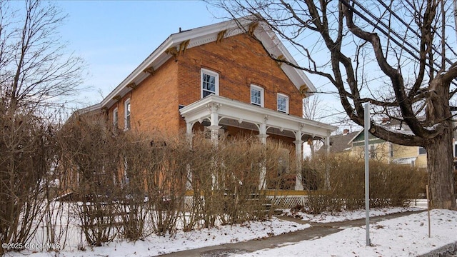 view of snow covered property