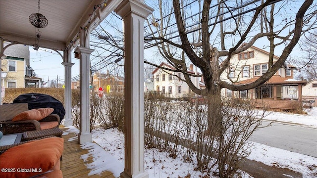 view of snow covered patio