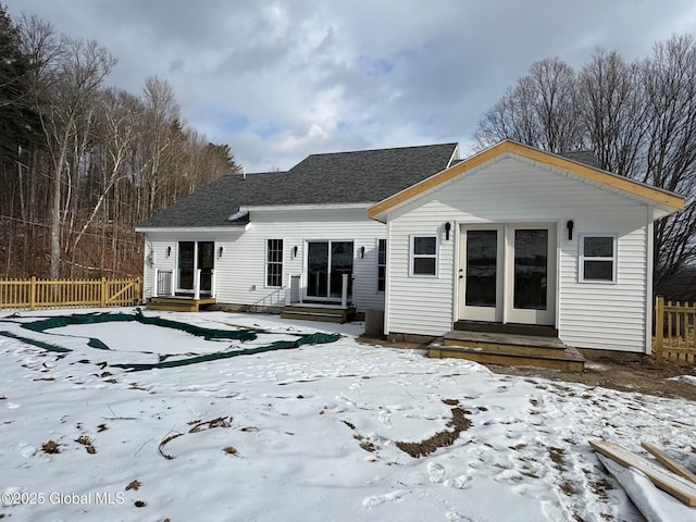 view of snow covered property